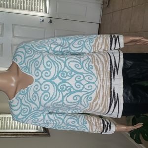 Bette Sung L Earth elements and wind swirls scatter on this silk v neck sweater